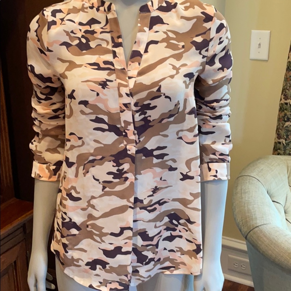 Pretty camo blouse with shiny shell buttons.